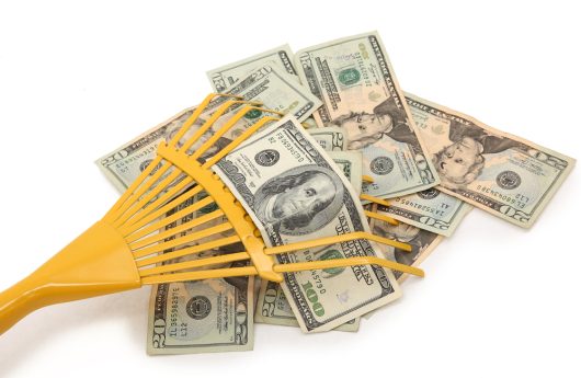 Yellow,Rake,Scooping,Up,Us,Dollar,Bills.,100s,And,20s.